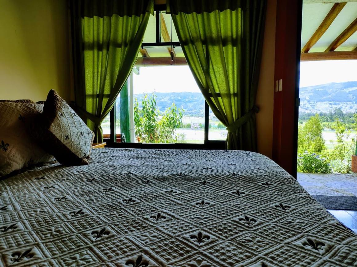 Hotel Cabanas San Cayetano Paipa Bagian luar foto