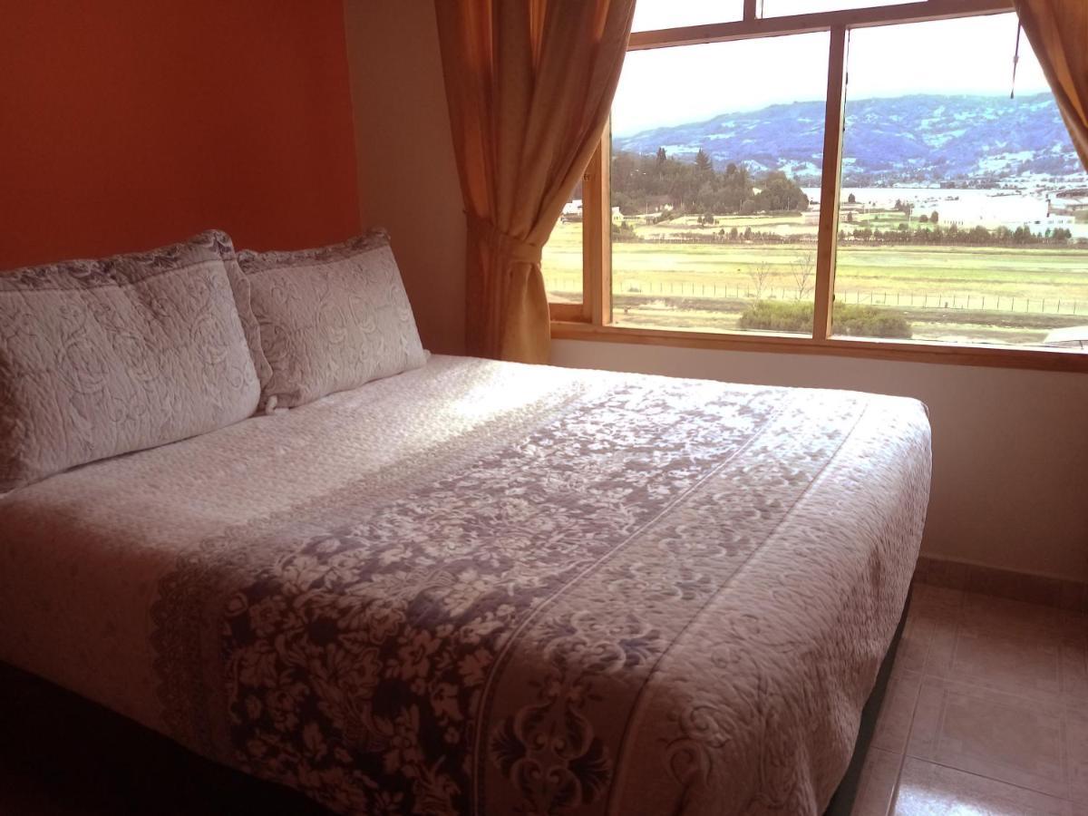 Hotel Cabanas San Cayetano Paipa Bagian luar foto